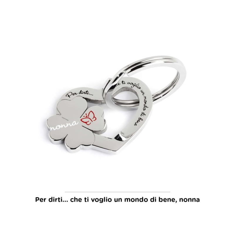 S.STEEL KEYRING WITH CLOVER S.Steel shape of heart keyring with four leef clover and writing "Per dirti ... che ti voglio un mon