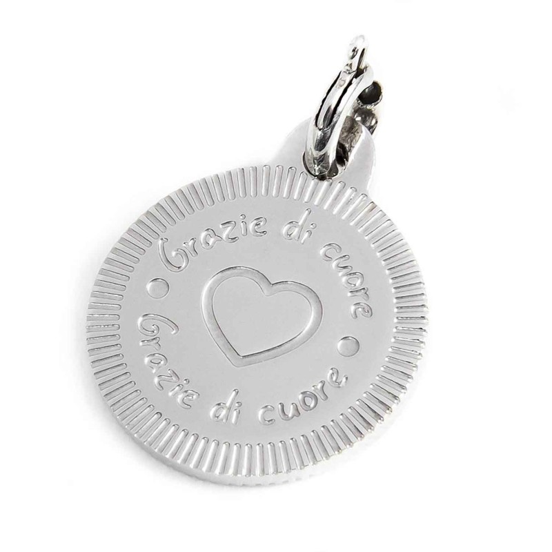 S.STEEL CHARM ROUND 14MM HEART/RAINBOW S.steel round charm 14 mm diameter with 1,10 mm thickness, on the front side, in the midd