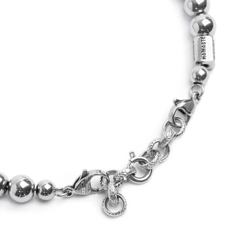 S.STEEL BR HEMATITE 8MM S.Steel bracelet with polished hematite spheres 8 mm diameter, in the center alternated with 4 polished