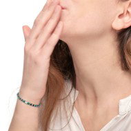 Bracciale con rondelle in malachite ed onice nera e cilindro diamantato