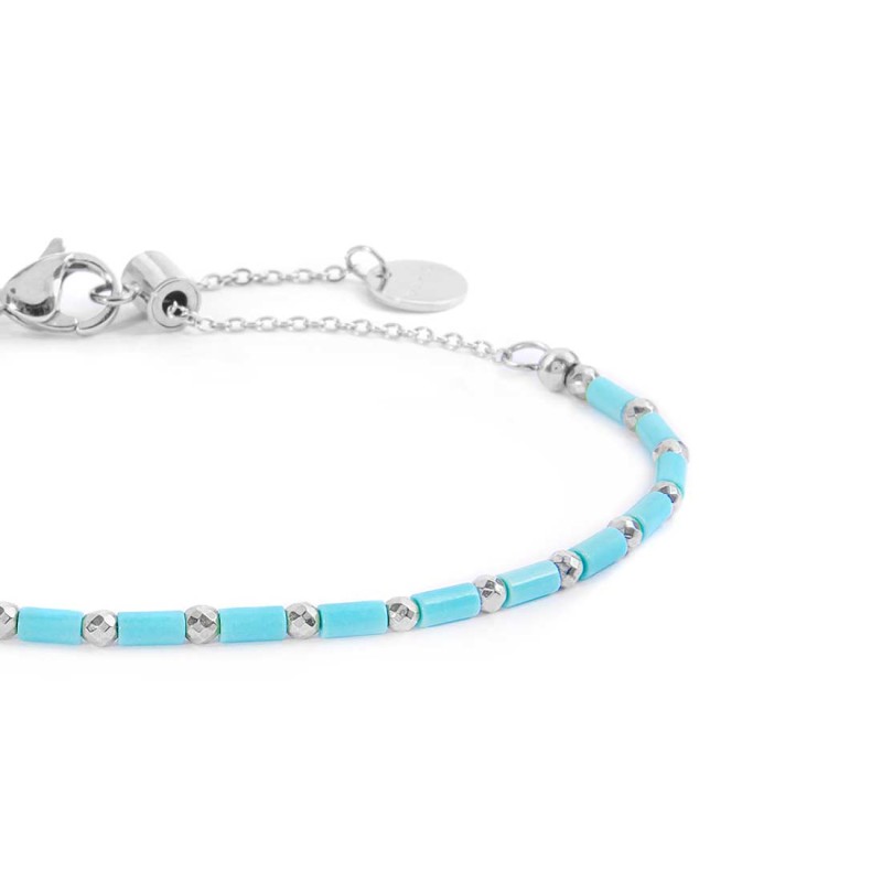 Bracciale con perline a tubo turchesi ed ematite