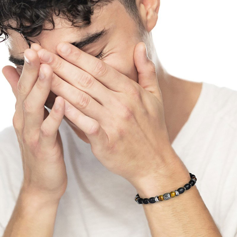 S.STEEL BR BLACK ONYX AND TIGER EYE S.steel bracelet with black onyx rice beads 9*6,30 mm, alternated with s.steel polished elem