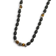 S.STEEL NECKLACE BLACK ONYX AND TIGER EYE S.steel necklace with black onyx rice beads 9*6,30 mm, alternated with s.steel polishe