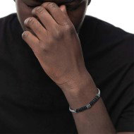 S.STEEL BR ROUND SNAKE CHAIN WITH LAVA STONE S.Steel bracelet with round snake chain 4,20 mm diameter. In the center lava stone