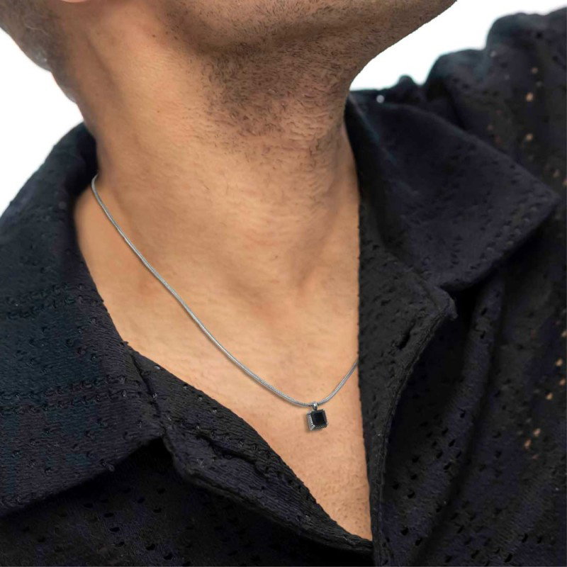 S.S. NECKLACE WITH SQUARED SNAKE CHAIN AND CZ STONE PEND S.steel necklace with squared snake chain 1,20 mm width. Squared pendan