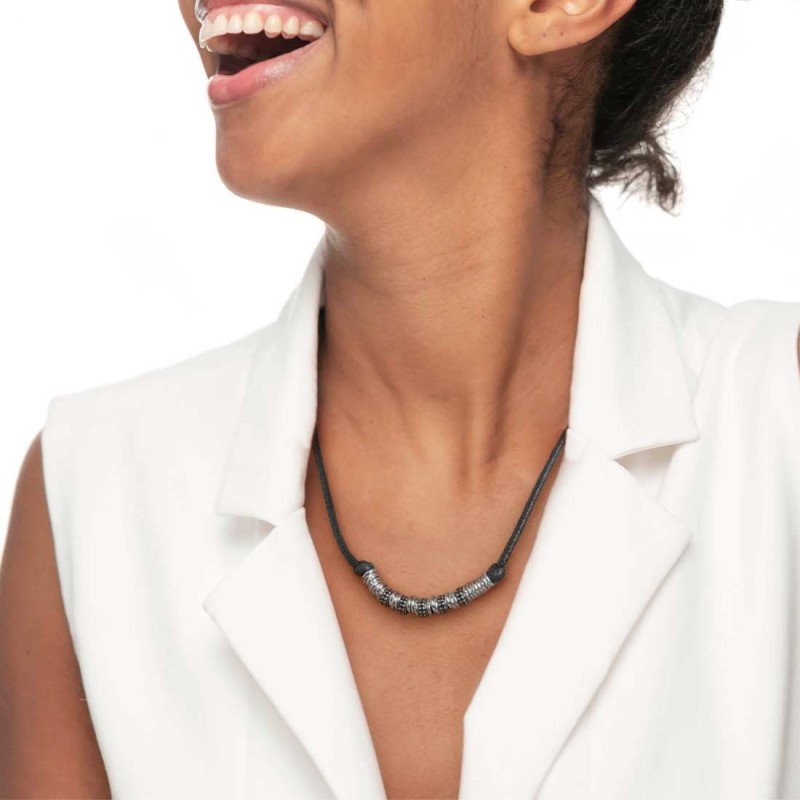 S.STEEL NECKLACE WITH BLACK STROBEL AND S.STEEL ELEMENTS Necklace with black strobel 2,90 mm diameter, with s.steel ring 1,20*6