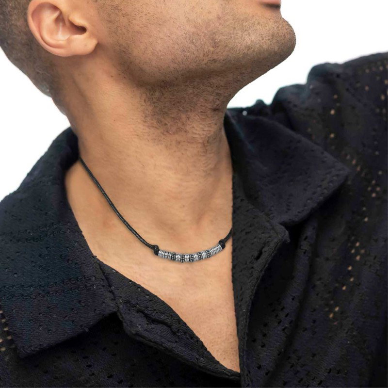 S.STEEL NECKLACE WITH BLACK STROBEL AND S.STEEL ELEMENTS Necklace with black strobel 2,90 mm diameter, with s.steel ring 1,20*6