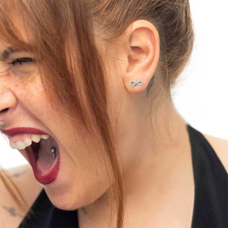 S.S. SINGLE EARRING INFINITY WITH CZ STONE S.steel single earring  made by CNC infinity shape size 4,50*10,20 mm with 6 round wh