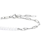 Bracciale con zircone nero centrale e bracciale con perle