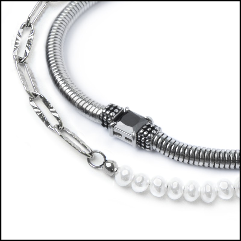 Bracciale con zircone nero centrale e bracciale con perle