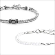 Bracciale con zircone nero centrale e bracciale con perle