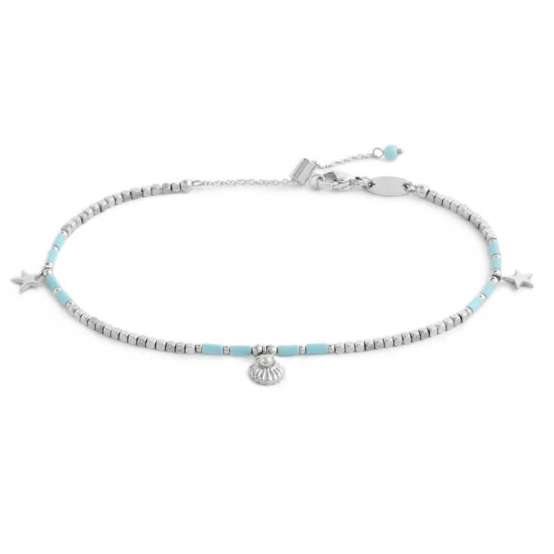 Cavigliera con ematite cubica alternata a perline conchiglia e stelle marine pendenti