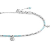 Cavigliera con ematite cubica alternata a perline conchiglia e stelle marine pendenti