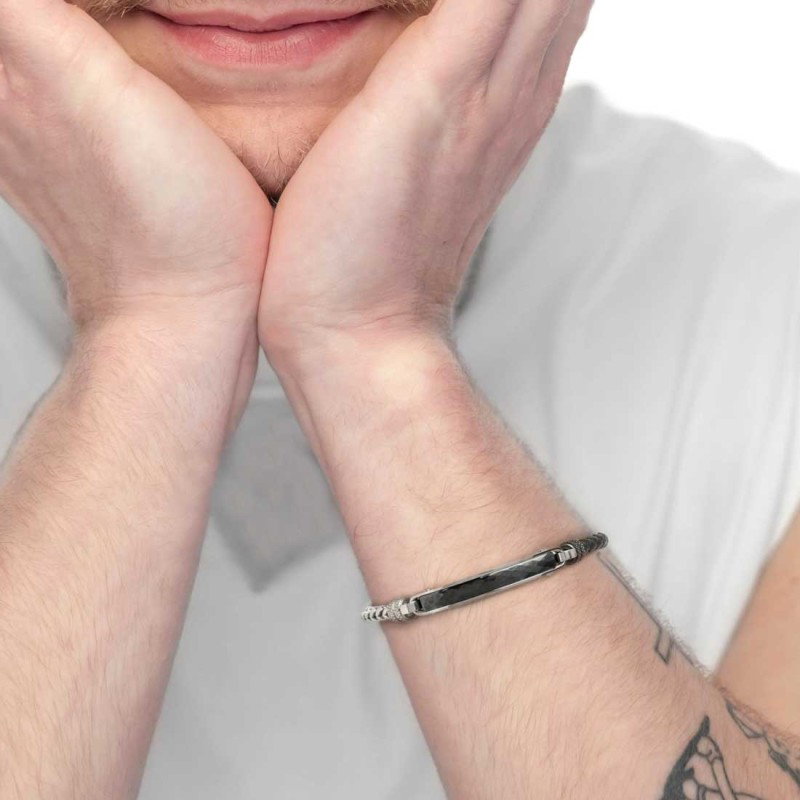 Bracciale pelle nera intrecciata e catena fishbone