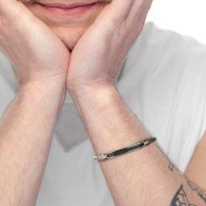 Bracciale pelle nera intrecciata e catena fishbone