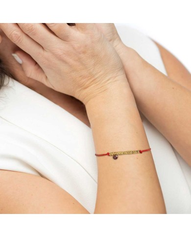 Bracciale cordino con elementi acciaio e zircone pendente