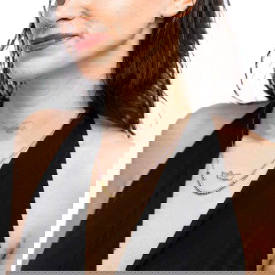 Collana cordino con sfere e rondelle al centro