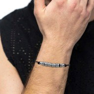 Bracciale cordino cerato rondelle in acciaio