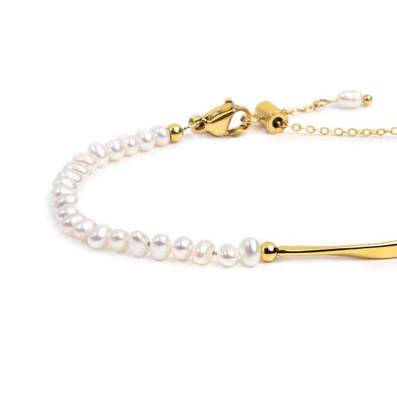 Bracciale semi rigido con tubolare twisted e catena con perle