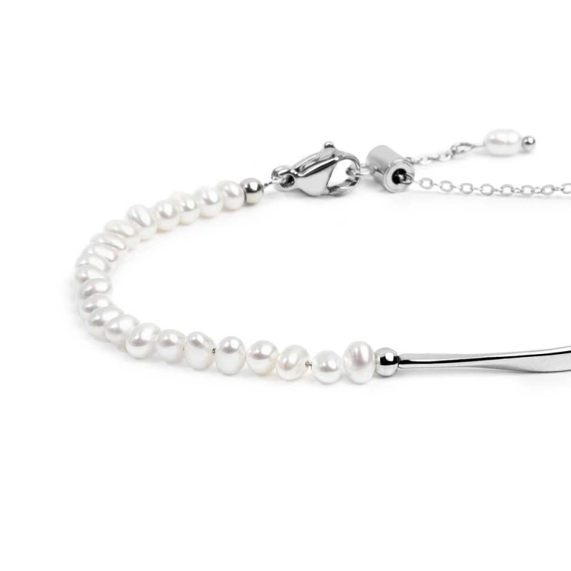 Bracciale semi rigido con tubolare twisted e catena con perle