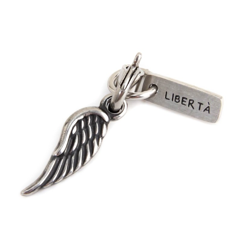 BURNISHED WING CHARM Burnished steel charm in the shape of a wing and rectangular tag with the word "Libertà"Man Class 27 Col
