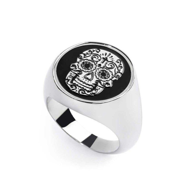 S.STEEL ROUND PLATE WITH MEXICAN SKULL Polished s.steel round plate 16,20 mm diameter, 1 mm thickness with on the front side mex